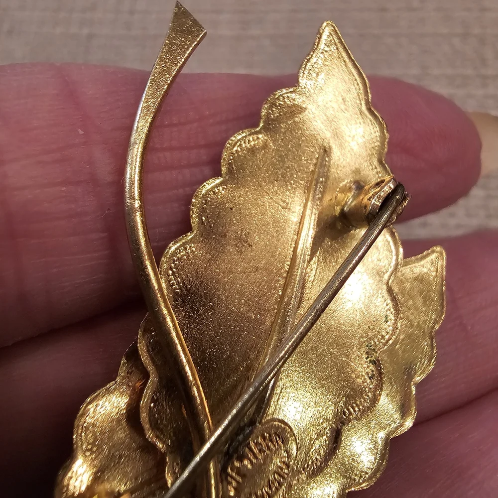 Vintage West Germany Mid Century goldtone leaf brooch w/ Aurora Borealis Stones